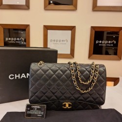 Chanel maxi classic flap caviar black