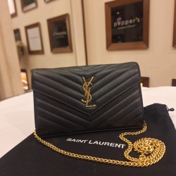 Saint Laurent Cassandre wallet on chain featuring quilted leather and the iconic YSL monogram