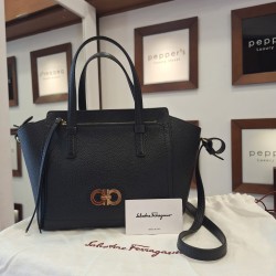 Salvatore Ferragamo Amy Pebbled Leather Tote Bag in black, featuring gold-tone Gancini hardware.