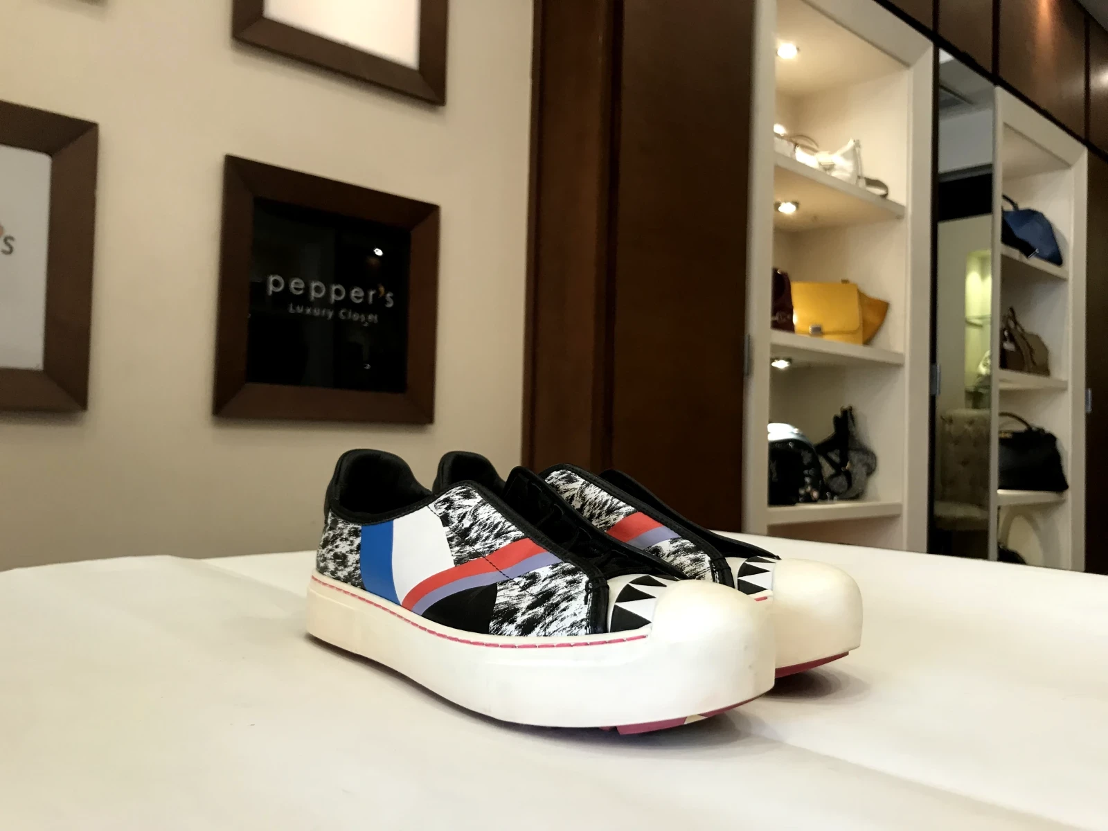 Fendi multicolor printed leather Flynn slip-on sneakers.