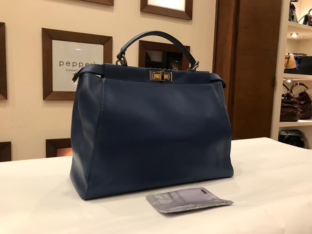 PEEKABOO LEATHER HANDBAG