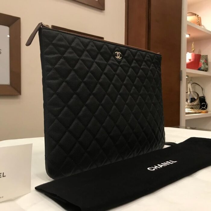 CHANEL CAVIAR LEATHER CLUTCH