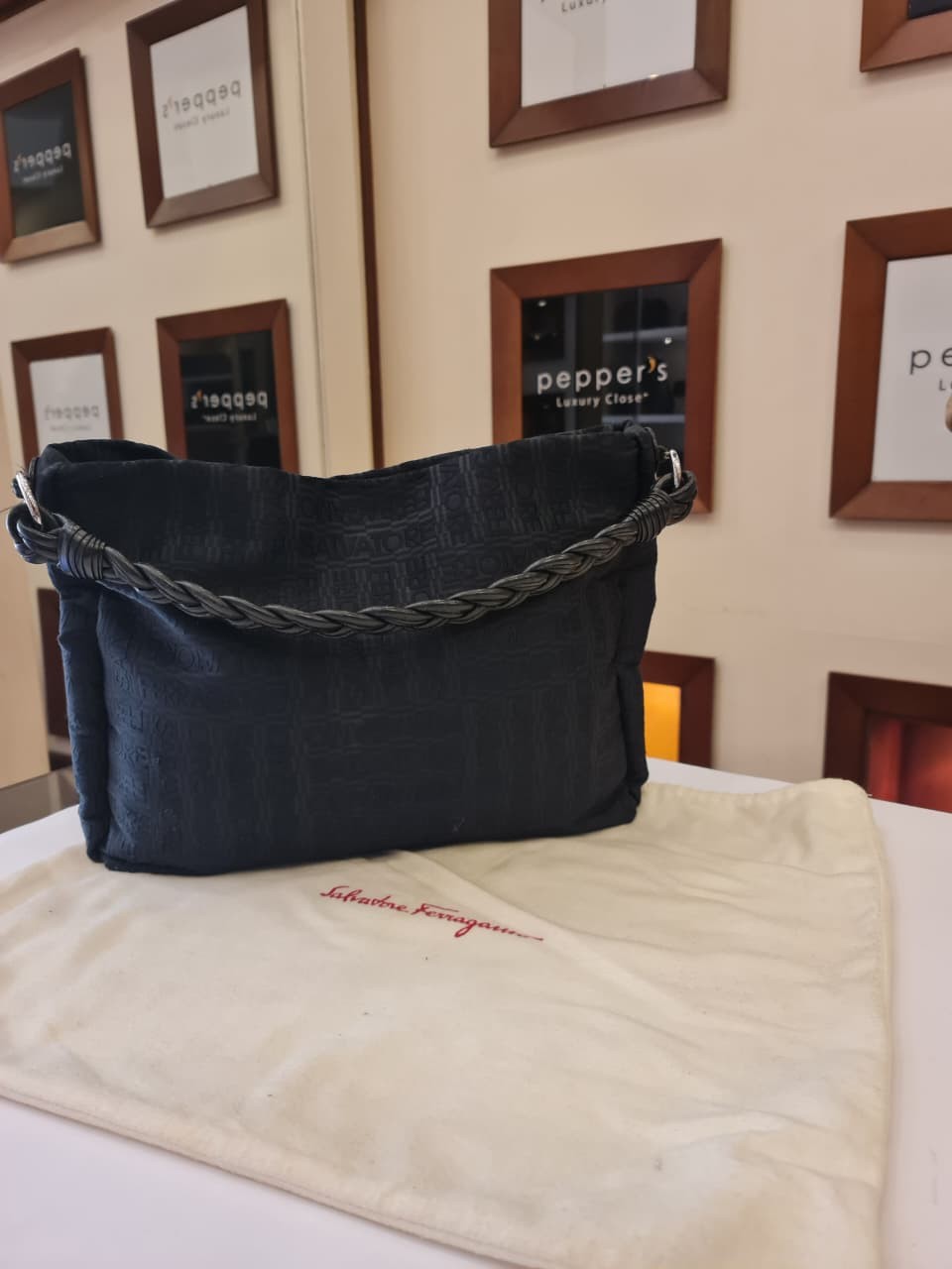 Salvatore Ferragamo logo subtly woven into the fabric.